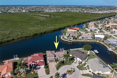EXCEPTIONAL TWO-STORY HOME IN BSI W/FANTASTIC CANAL BASIN VIEW & on Twin Isles Country Club in Florida - for sale on GolfHomes.com, golf home, golf lot