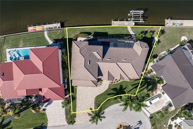 EXCEPTIONAL TWO-STORY HOME IN BSI W/FANTASTIC CANAL BASIN VIEW & on Twin Isles Country Club in Florida - for sale on GolfHomes.com, golf home, golf lot