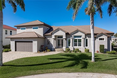 EXCEPTIONAL TWO-STORY HOME IN BSI W/FANTASTIC CANAL BASIN VIEW & on Twin Isles Country Club in Florida - for sale on GolfHomes.com, golf home, golf lot