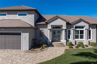 EXCEPTIONAL TWO-STORY HOME IN BSI W/FANTASTIC CANAL BASIN VIEW & on Twin Isles Country Club in Florida - for sale on GolfHomes.com, golf home, golf lot