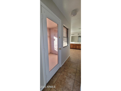 Welcome to this stunning 4-bedroom, 2.5-bathroom home in the on The Golf Club At Johnson Ranch in Arizona - for sale on GolfHomes.com, golf home, golf lot