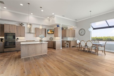 Under contract-accepting backup offers. EXCEPTIONAL TWO-STORY on Twin Isles Country Club in Florida - for sale on GolfHomes.com, golf home, golf lot