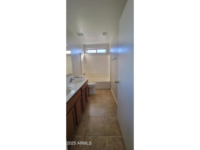 Welcome to this stunning 4-bedroom, 2.5-bathroom home in the on The Golf Club At Johnson Ranch in Arizona - for sale on GolfHomes.com, golf home, golf lot