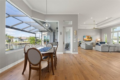 Under contract-accepting backup offers. EXCEPTIONAL TWO-STORY on Twin Isles Country Club in Florida - for sale on GolfHomes.com, golf home, golf lot