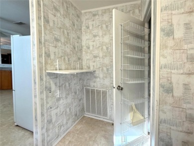 WELCOME to this spacious home in the resort-style 55+ on Apollo Beach Golf and Sea Club in Florida - for sale on GolfHomes.com, golf home, golf lot