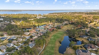 Enjoy your views of the Magnolia Point Golf course from this on Magnolia Point Golf and Country Club in Florida - for sale on GolfHomes.com, golf home, golf lot