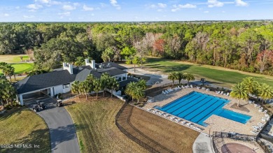 Enjoy your views of the Magnolia Point Golf course from this on Magnolia Point Golf and Country Club in Florida - for sale on GolfHomes.com, golf home, golf lot