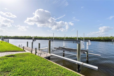 Under contract-accepting backup offers. EXCEPTIONAL TWO-STORY on Twin Isles Country Club in Florida - for sale on GolfHomes.com, golf home, golf lot