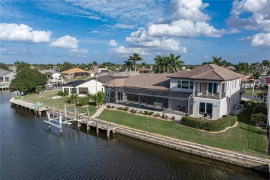 Under contract-accepting backup offers. EXCEPTIONAL TWO-STORY on Twin Isles Country Club in Florida - for sale on GolfHomes.com, golf home, golf lot