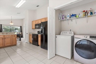 Nestled beneath swaying palm trees in the desirable gated on Southern Dunes Golf and Country Club in Florida - for sale on GolfHomes.com, golf home, golf lot