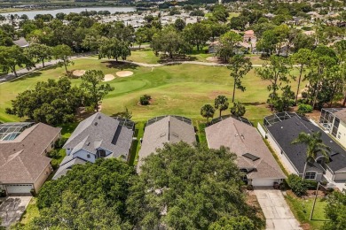 Nestled beneath swaying palm trees in the desirable gated on Southern Dunes Golf and Country Club in Florida - for sale on GolfHomes.com, golf home, golf lot