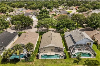 Nestled beneath swaying palm trees in the desirable gated on Southern Dunes Golf and Country Club in Florida - for sale on GolfHomes.com, golf home, golf lot