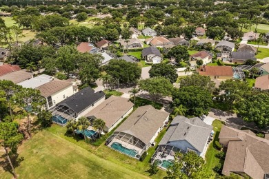 Nestled beneath swaying palm trees in the desirable gated on Southern Dunes Golf and Country Club in Florida - for sale on GolfHomes.com, golf home, golf lot