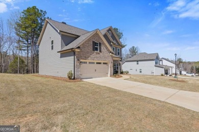 Live the Resort Lifestyle in the Stunning Southport Model by on Traditions of Braselton Golf Club in Georgia - for sale on GolfHomes.com, golf home, golf lot