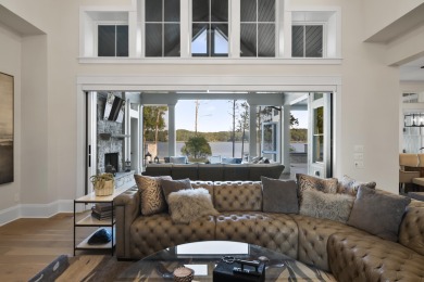 Welcome to this breathtaking waterfront retreat, where luxury on Reynolds Lake Oconee - The Oconee in Florida - for sale on GolfHomes.com, golf home, golf lot