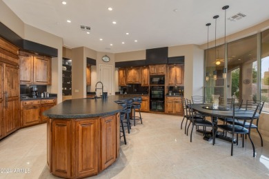 Contemporary elegance abounds in this custom masterpiece in on Troon North Golf Club  in Arizona - for sale on GolfHomes.com, golf home, golf lot