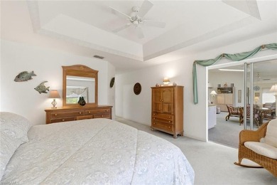 This spacious home with tremendous curb appeal is being sold on Riviera Golf Club in Florida - for sale on GolfHomes.com, golf home, golf lot