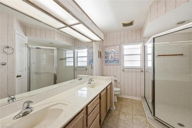 This spacious home with tremendous curb appeal is being sold on Riviera Golf Club in Florida - for sale on GolfHomes.com, golf home, golf lot