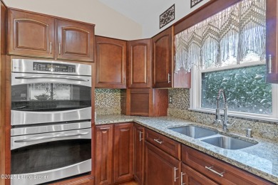 Discover serene, nature-filled living in this updated ranch home on Doe Valley Country Club in Kentucky - for sale on GolfHomes.com, golf home, golf lot
