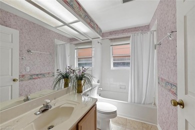 This spacious home with tremendous curb appeal is being sold on Riviera Golf Club in Florida - for sale on GolfHomes.com, golf home, golf lot