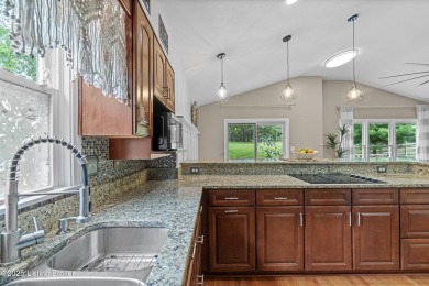 Discover serene, nature-filled living in this updated ranch home on Doe Valley Country Club in Kentucky - for sale on GolfHomes.com, golf home, golf lot
