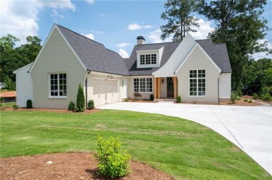Welcome to this stunning custom-built residence nestled in the on Sunset Hills Country Club in Georgia - for sale on GolfHomes.com, golf home, golf lot