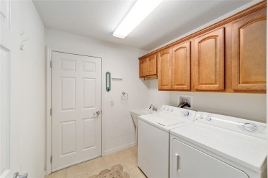 LOCATION, LOCATION, LOCATION! BOND PAID! TURN-KEY! GOLF & WATER on The Links of Spruce Creek in Florida - for sale on GolfHomes.com, golf home, golf lot