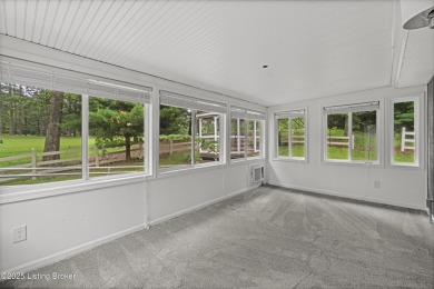 Discover serene, nature-filled living in this updated ranch home on Doe Valley Country Club in Kentucky - for sale on GolfHomes.com, golf home, golf lot