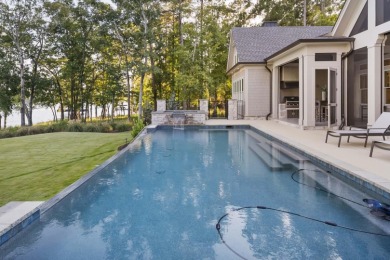 Welcome to this breathtaking waterfront retreat, where luxury on Reynolds Lake Oconee - The Oconee in Florida - for sale on GolfHomes.com, golf home, golf lot