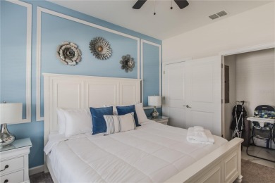 Featuring four bedrooms and three bathrooms, this home provides on The Oasis Club at Champions Gate in Florida - for sale on GolfHomes.com, golf home, golf lot