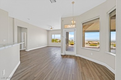 SPECTACULAR PANORAMIC GOLF COURSE, MOUNTAIN AND CITY VIEWS - on Highland Falls Golf Club in Nevada - for sale on GolfHomes.com, golf home, golf lot