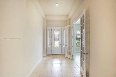 **REDUCED TO SELL**
This 4-bedroom, 3-bathroom home, plus 2 dens on Palm Beach Gardens Golf Course in Florida - for sale on GolfHomes.com, golf home, golf lot