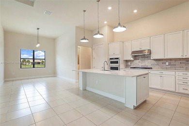 **REDUCED TO SELL**
This 4-bedroom, 3-bathroom home, plus 2 dens on Palm Beach Gardens Golf Course in Florida - for sale on GolfHomes.com, golf home, golf lot