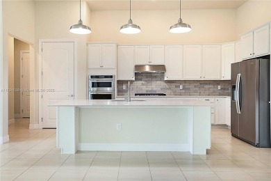 **REDUCED TO SELL**
This 4-bedroom, 3-bathroom home, plus 2 dens on Palm Beach Gardens Golf Course in Florida - for sale on GolfHomes.com, golf home, golf lot