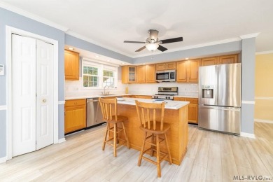 Enjoy main lake views and water-access living from this cape cod on Tanglewood Shores Golf Club in Virginia - for sale on GolfHomes.com, golf home, golf lot