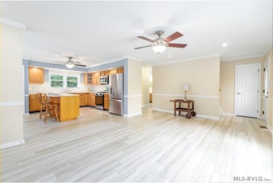 Enjoy main lake views and water-access living from this cape cod on Tanglewood Shores Golf Club in Virginia - for sale on GolfHomes.com, golf home, golf lot