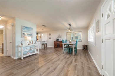 YOUR OWN PERSONAL PRIVATE PARADISE IN DELIGHTFUL DUNEDIN on The Dunedin Country Club in Florida - for sale on GolfHomes.com, golf home, golf lot