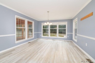 Enjoy main lake views and water-access living from this cape cod on Tanglewood Shores Golf Club in Virginia - for sale on GolfHomes.com, golf home, golf lot