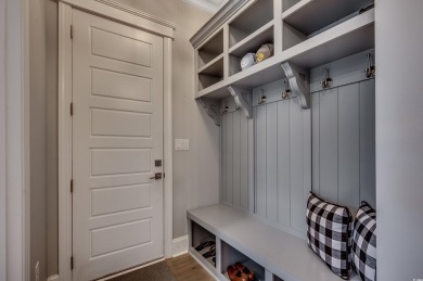 This stunning home, built in 2020 by a local custom builder on Myrtlewood Golf Course and Club  in South Carolina - for sale on GolfHomes.com, golf home, golf lot