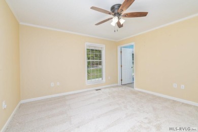 Enjoy main lake views and water-access living from this cape cod on Tanglewood Shores Golf Club in Virginia - for sale on GolfHomes.com, golf home, golf lot