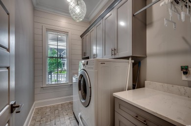 This stunning home, built in 2020 by a local custom builder on Myrtlewood Golf Course and Club  in South Carolina - for sale on GolfHomes.com, golf home, golf lot