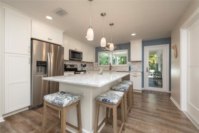 YOUR OWN PERSONAL PRIVATE PARADISE IN DELIGHTFUL DUNEDIN on The Dunedin Country Club in Florida - for sale on GolfHomes.com, golf home, golf lot