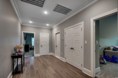 This stunning home, built in 2020 by a local custom builder on Myrtlewood Golf Course and Club  in South Carolina - for sale on GolfHomes.com, golf home, golf lot