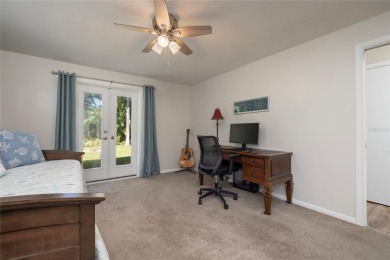 YOUR OWN PERSONAL PRIVATE PARADISE IN DELIGHTFUL DUNEDIN on The Dunedin Country Club in Florida - for sale on GolfHomes.com, golf home, golf lot