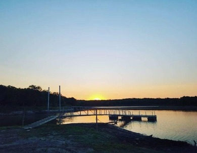 Welcome to your vibrant lake escape in the Simmons Shores on Tanglewood Resort in Texas - for sale on GolfHomes.com, golf home, golf lot