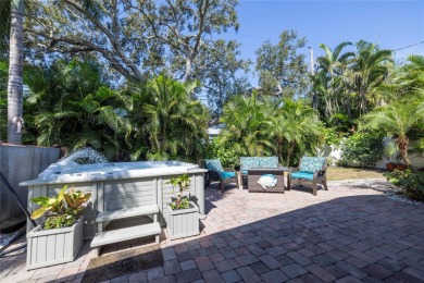 YOUR OWN PERSONAL PRIVATE PARADISE IN DELIGHTFUL DUNEDIN on The Dunedin Country Club in Florida - for sale on GolfHomes.com, golf home, golf lot