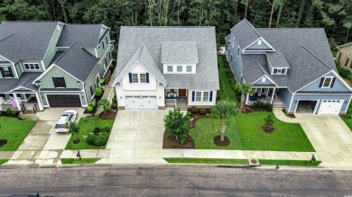 This stunning home, built in 2020 by a local custom builder on Myrtlewood Golf Course and Club  in South Carolina - for sale on GolfHomes.com, golf home, golf lot