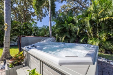 YOUR OWN PERSONAL PRIVATE PARADISE IN DELIGHTFUL DUNEDIN on The Dunedin Country Club in Florida - for sale on GolfHomes.com, golf home, golf lot