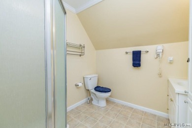 Enjoy main lake views and water-access living from this cape cod on Tanglewood Shores Golf Club in Virginia - for sale on GolfHomes.com, golf home, golf lot
