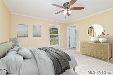 Enjoy main lake views and water-access living from this cape cod on Tanglewood Shores Golf Club in Virginia - for sale on GolfHomes.com, golf home, golf lot